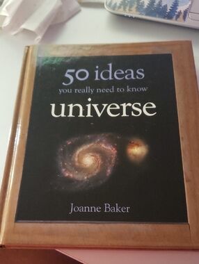 Universe: 50 Ideas You Really Need to Know by Joanne Baker - Black & Brown Cover